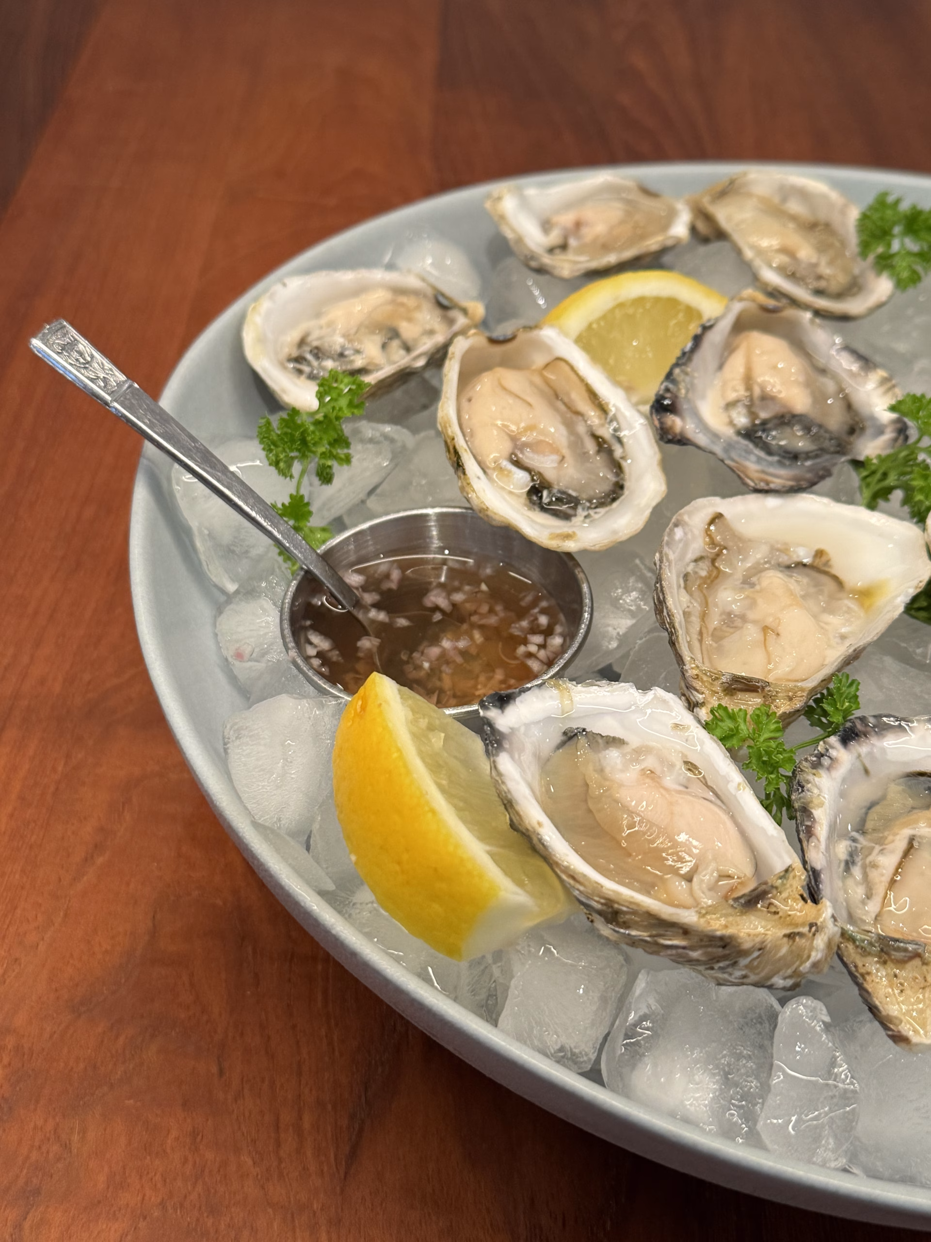 Fresh oysters on the half shell with lemon